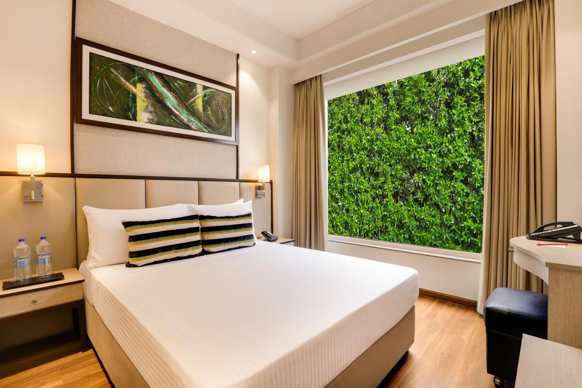 แซนดัล สวีท ดำเนินงานโดยเลมอนทรีโฮเต็ล Hotel โนอิดา ภายนอก รูปภาพ
