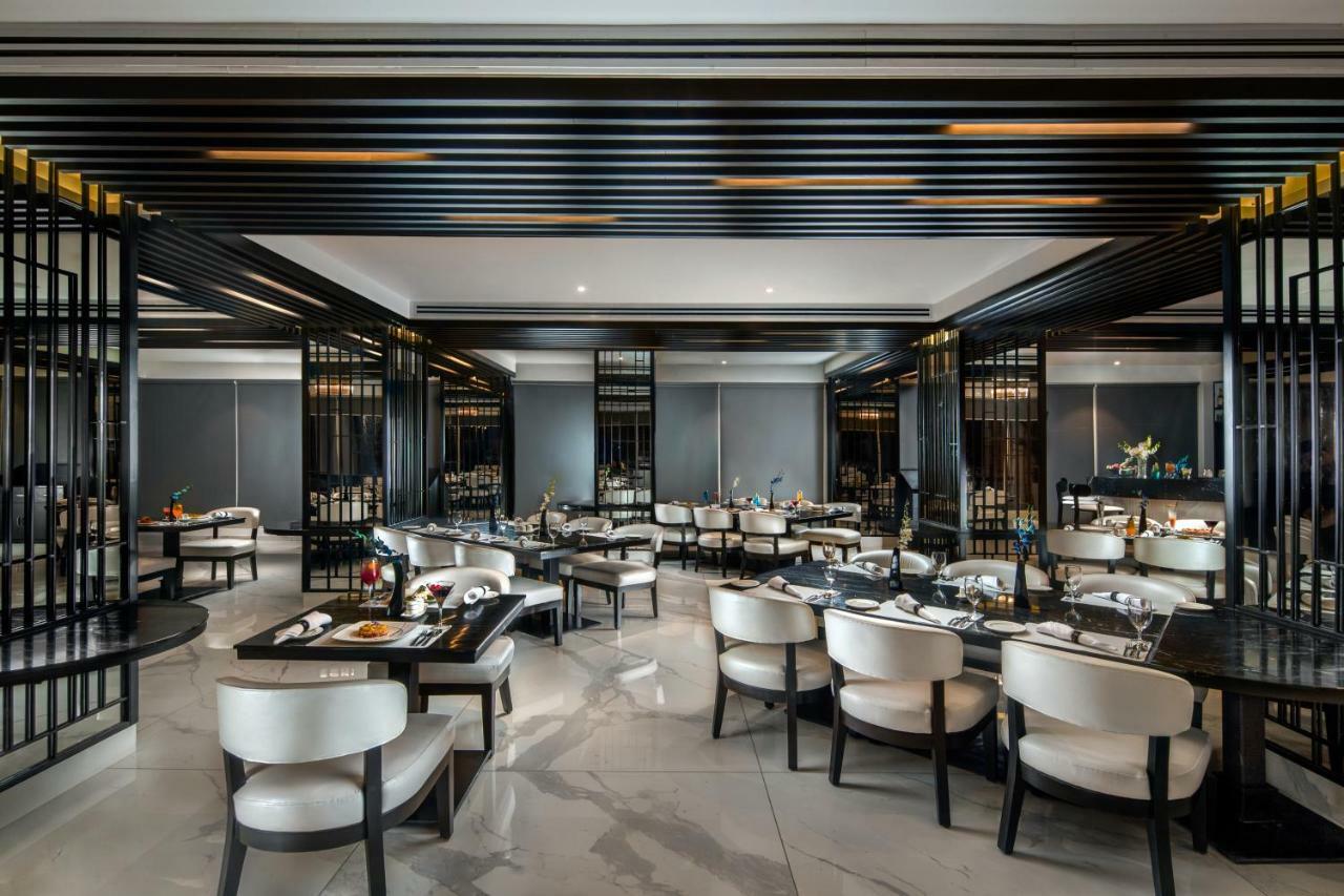 แซนดัล สวีท ดำเนินงานโดยเลมอนทรีโฮเต็ล Hotel โนอิดา ภายนอก รูปภาพ